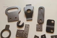 精密沖壓件產生時出現翻料、扭曲的原因及解決方法